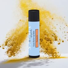 Load image into Gallery viewer, Lip balm with turmeric powder thrown 

